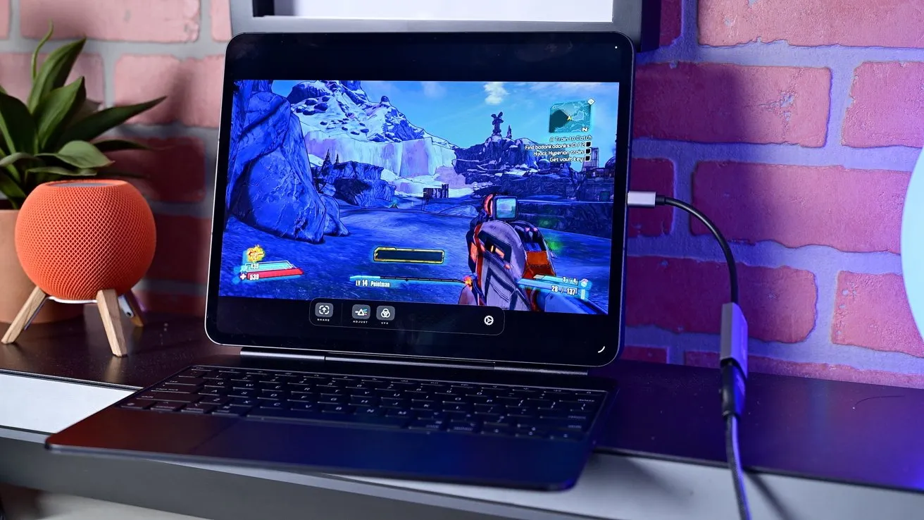 یک بازی شوتر برفی نمایش داده شده روی صفحه آی‌پد با کنترلر و اسپیکر کنار آن